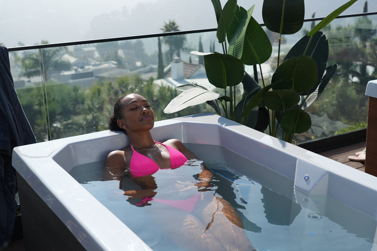 Woman Using Alpine on Balcony