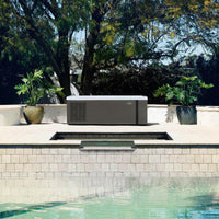 Side view of the cold tub on a pool deck