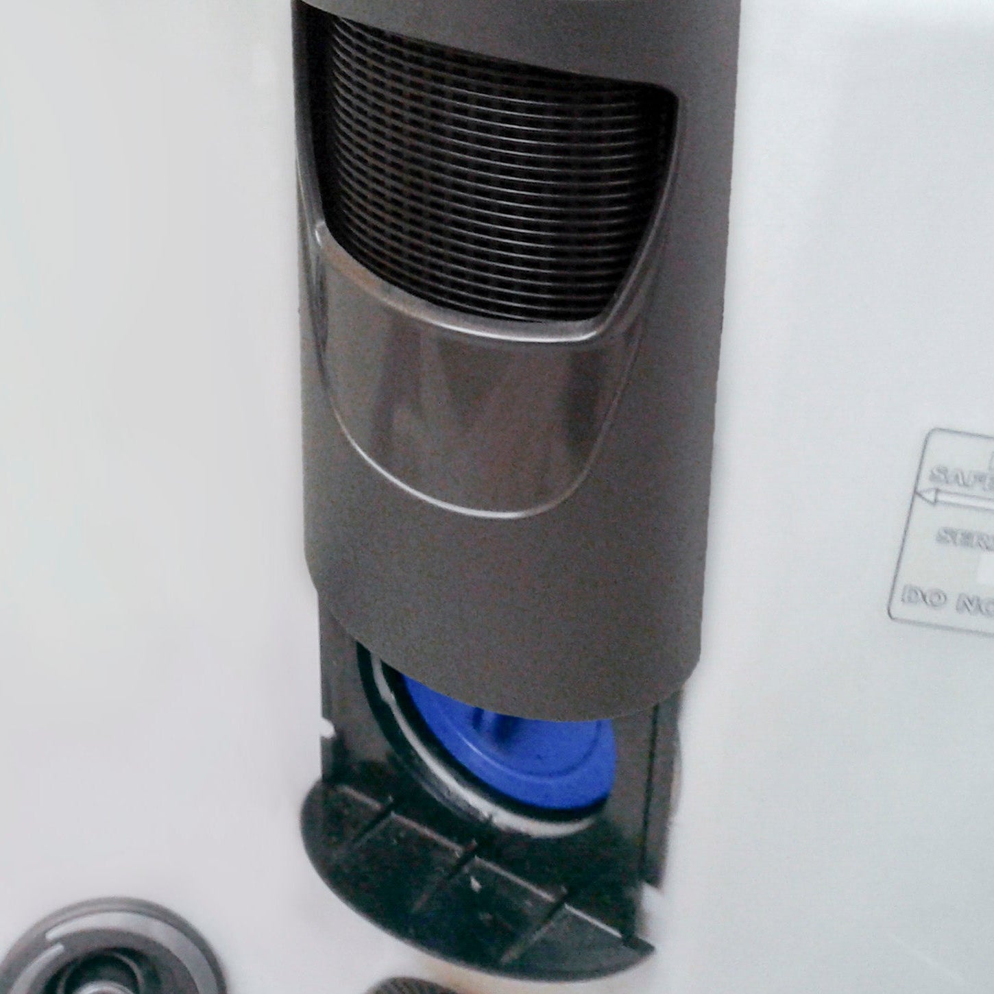 Close-up of a skimmer filter housing with a filter inserted