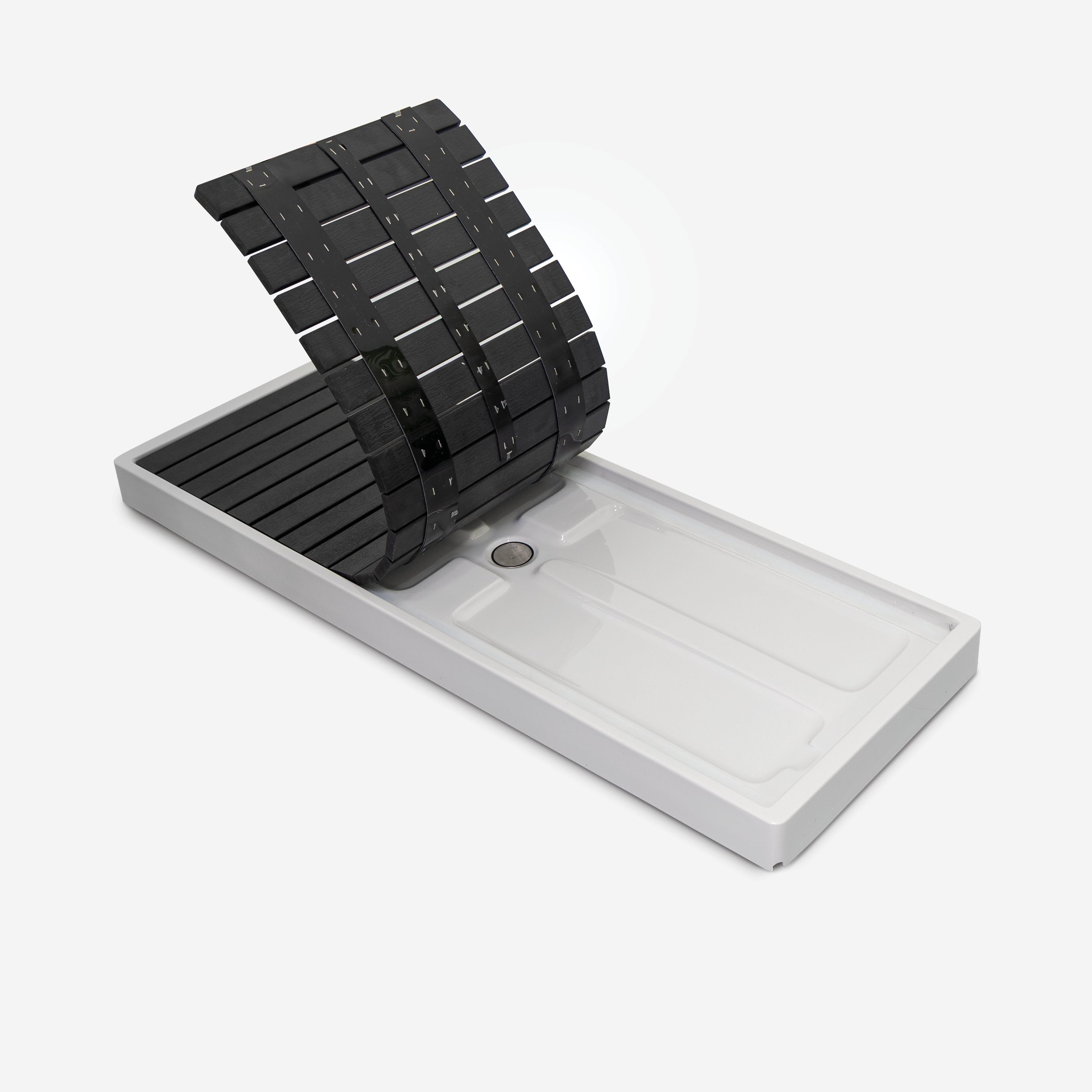 A black and white spa step with a black mesh mat on top, designed for use in a pool or spa.