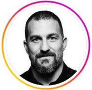 Circular profile picture of Andrew Huberman with a blurred background